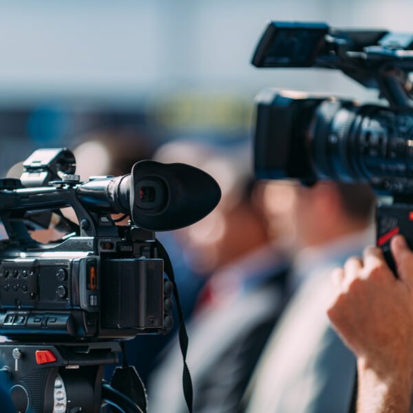 Cameraman Recording Event At Media Press Conference